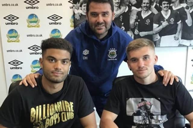 Linfield boss David Healy with new signings Ahmed Salam and Billy Chadwick. Picture courtesy of Linfield FC