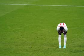 England's Marcus Rashford stands dejected after missing from the penalty spot during the UEFA Euro 2020 Final at Wembley. PA Photo