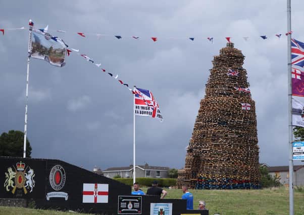 A huge bonfire is built in the loyalist Kilcooley area of Bangor Co Down to usher in the Twelfth commemorations. Bonfires are now being targeted Photo: Niall Carson/PA Wire