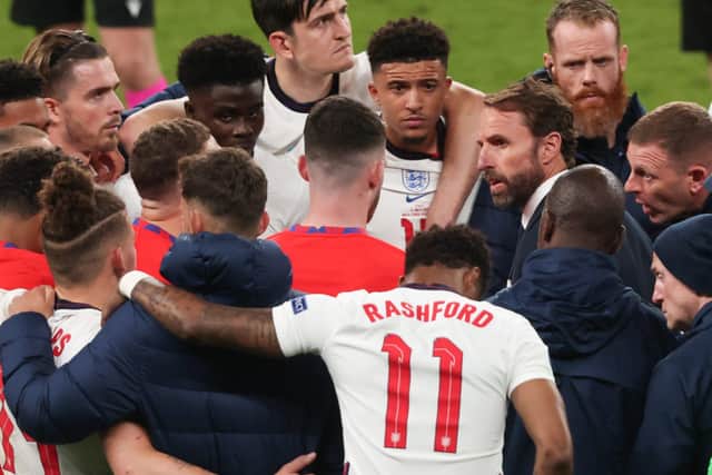 England manager Gareth Southgate, seen above talking to his players during the Euros final, has taught values that contrast with those of show-offs of past generations who spent their money on champagne