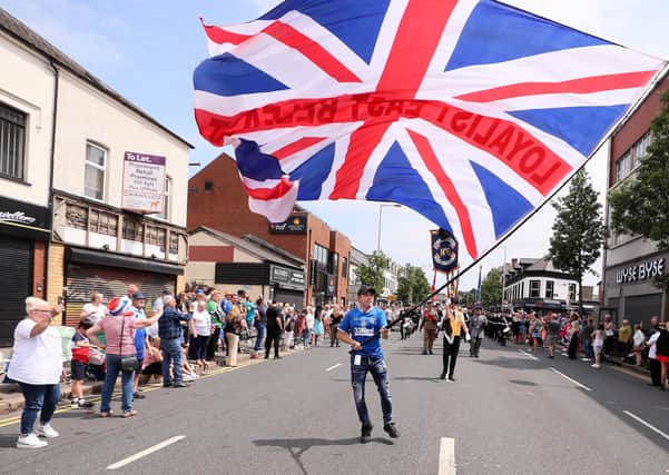A parade takes places on the Newtownards Road in east Belfast