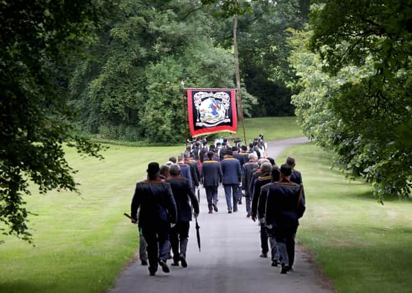 Members of Scarva's Royal Black Institution preceptory, Sir Knight Alfred Buller Memorial RBP 1000, return to Scarvagh House after laying a wreath at the war memorial in the Co Down village today.
The annual Sham Fight held in the village each July 13th was cancelled for a second year because of the Coronavirus restrictions.
PICTURE BY STEPHEN DAVISON
