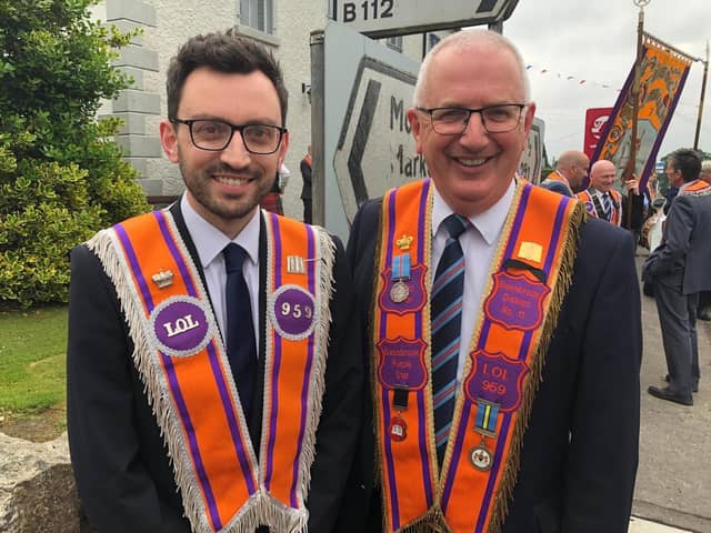 Danny Kennedy with his son Stephen on the Twelfth in Bessbrook