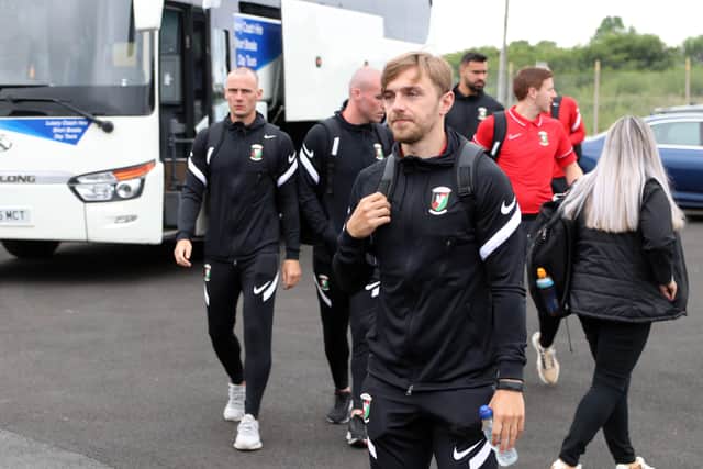 Glentoran players arrive ready to face The New Saints in Wales. Pic by Pacemaker.