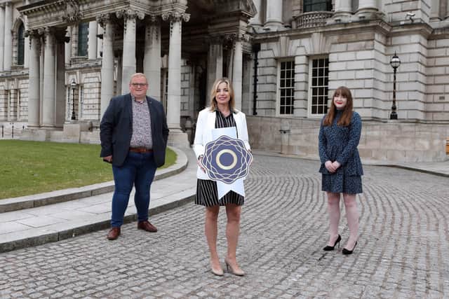 Councillor Seamas de Faoite, LGBT+ champion, and Councillor Aine Groogan, chair of Belfast City Council’s Women’s Steering Group, accept the Silver Diversity Mark from Christine White, head of Diversity Mark, in recognition of the Council’s commitment to promoting equality and diversity in its workforce