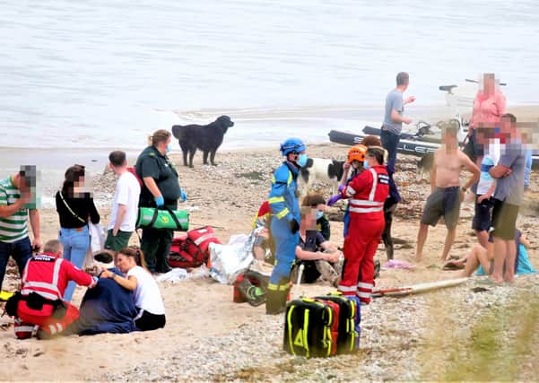 The beach at Ballycastle after the incident involving water bikes (one of which is pictured in the background here)