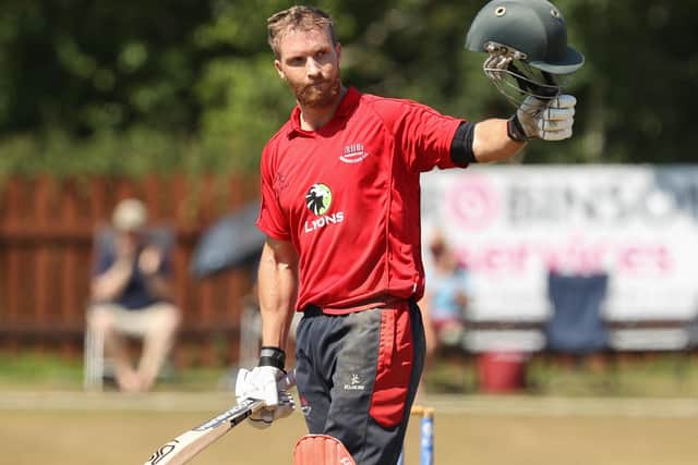 Andre Malan celebrates passing the century mark during a superb Waringstown team performance. Pic by Pacemaker.