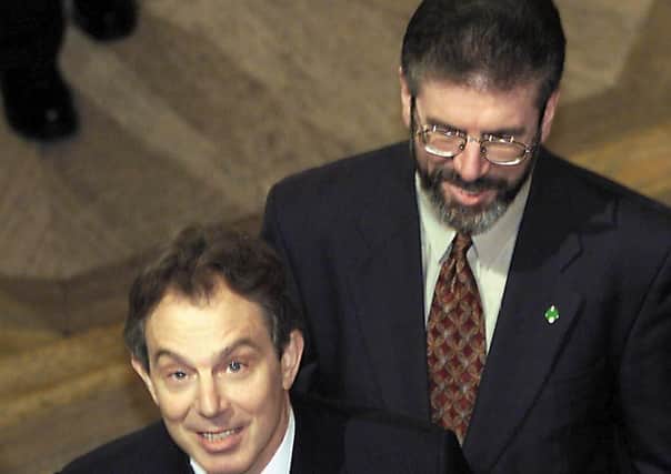Tony Blair (front) with Gerry Adams at Stormont in Belfast in December 2000. PA image