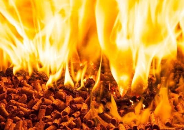 Wood pellets aflame
