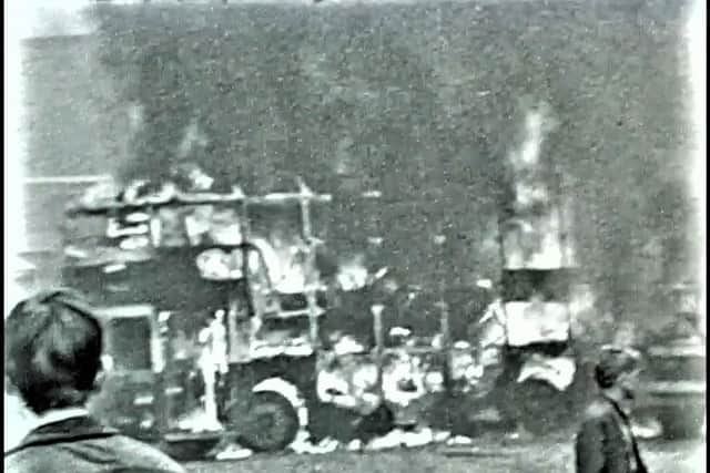 A burning bus in 1969 Belfast