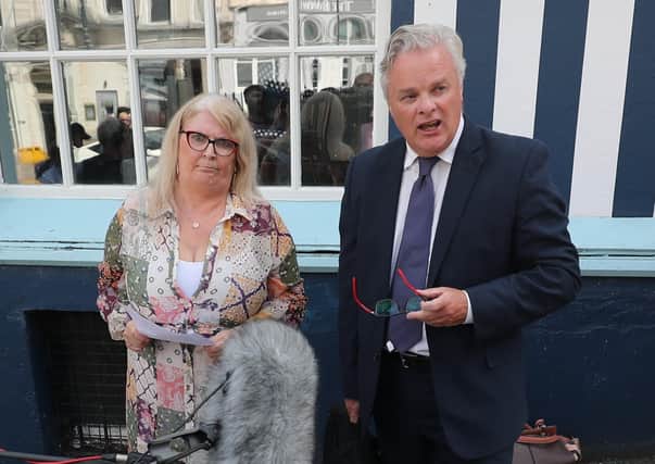 Kathleen Arkinson, sister of murdered schoolgirl Arlene Arkinson, and Solicitor Des Doherty speaking to the media after a coroner delivered his findings outside Omagh Courthouse in County Tyrone in the case of the missing schoolgirl. Picture date: Wednesday July 21, 2021.
