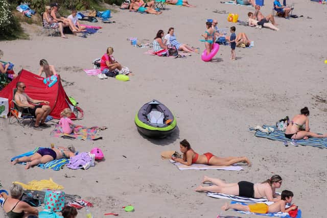 People relaxing on the beach at Portavoe in Co. Down. (Photo: Presseye)