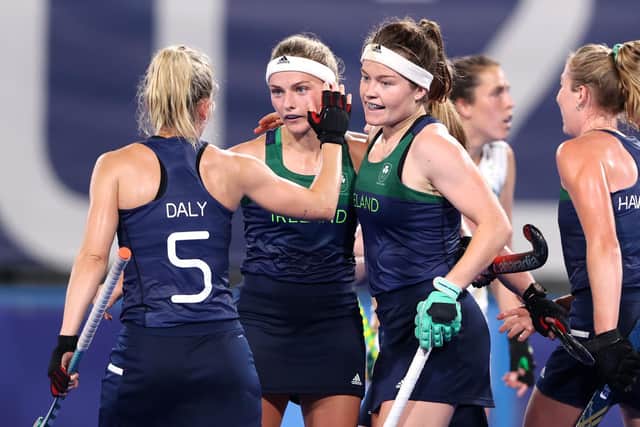 Sarah Torrans (2ndR) of Team Ireland celebrates scoring the second goal with Nicola Daly during the Women's Preliminary Pool A match between Ireland and South Africa
