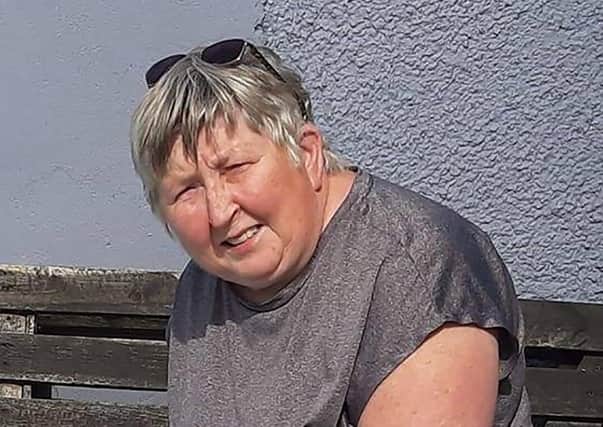 Tributes have been paid to Kilkeel woman Sharon Perry after the emergency services recovered her the from water near Kilkeel Harbour.