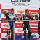 Runner-up John McGuinness (left) on the rostrum at Brands Hatch with race winner Chris Walker and Edmund Best.