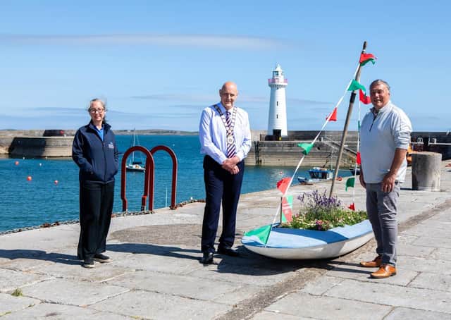 Mayor of Ards and North Down, Councillor Mark Brooks is pictured at Donaghadee Harbour ahead of the Bicentenary Celebrations with John Caldwell, Donaghadee Community Development Association and Heather McGuicken, Museum Manager, Ards and North Down Borough Council