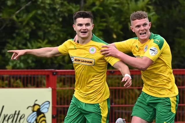 Daire O’Connor (left) celebrates scoring a goal last season for Cliftonville. Pic by Pacemaker.