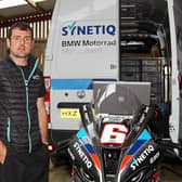 Michael Dunlop pictured with the SYNETIQ BMW in the paddock at Armoy on Friday.