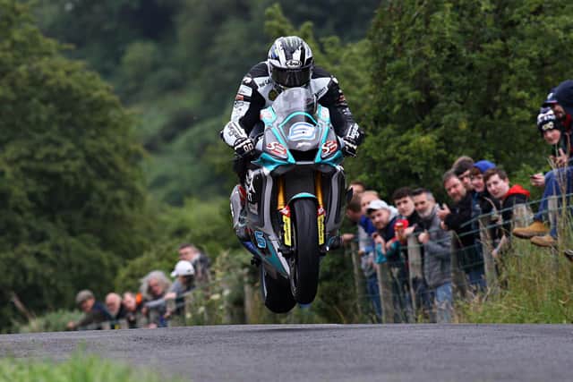 Michael Dunlop won the second Supersport race at Armoy on Saturday to make it a hat-trick at the first Irish road race of the year in Co Antrim.