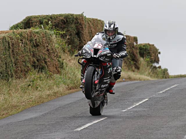 Michael Dunlop won the Open A Superbike race at Armoy on Saturday and set a new lap record on the SYNETIQ BMW.
