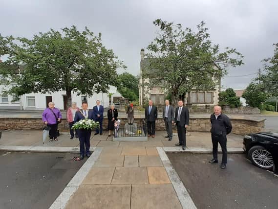 A short commemorative event at the Claudy bomb memorial site in the village on July 31 2021. on the anniversary of the 1972 Provisional IRA bomb there