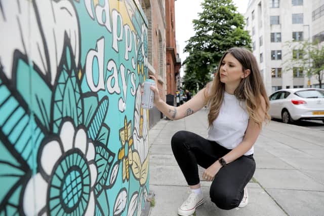 Artist Danni Simpson finishes of one of her artworks as part of phase 2 of Belfast City Council’s Belfast Canvas Project. Picture: Philip Magowan / Press Eye