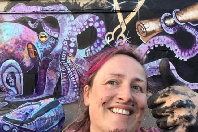 Painter Carla Hodgson who painted an Octopus mural during the Open House Festival