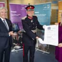 David McCorkell, Lord Lieutenant of Antrim presents the Queen’s Award for Enterprise to NI Water represented by Sara Venning, CEO and Len O’Hagan, Chairman (2020)
