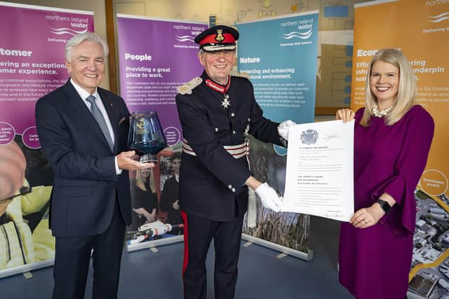 David McCorkell, Lord Lieutenant of Antrim presents the Queen’s Award for Enterprise to NI Water represented by Sara Venning, CEO and Len O’Hagan, Chairman (2020)