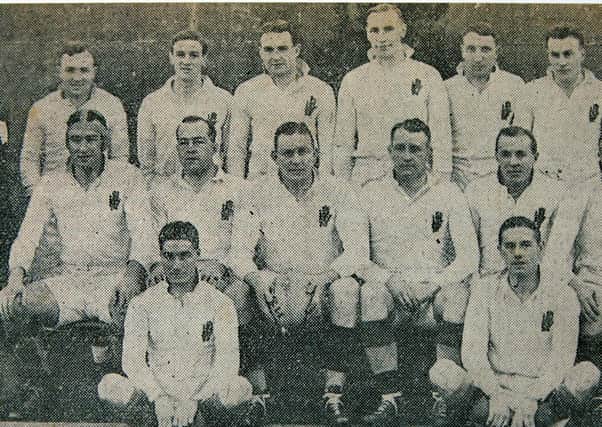 Blair Mayne (standing third from right) and Sammy Walker (seated second from right) pictured playing for Ulster