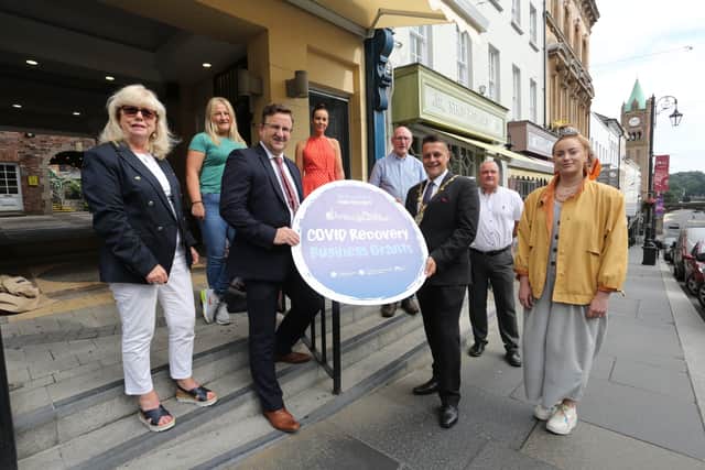 Mayor of Derry City and Strabane District, Alderman Graham Warke, with some of the local business people from the Craft Village. Included are Colin Greer, Department for the Communities, centre, with from left, Helen Quigley, Chief Executive, Inner City Trust, Ursula Nicholl, Stitch Express, Louise Breslin, DCSDC, John Tierney, Shoe Repairs, Eoin Doherty, James O Doherty & Co and Aoife Doherty, Sass & Halo