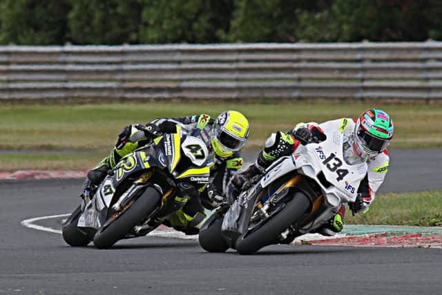 Alastair Seeley (IFS Yamaha) leads Ali Kirk (AKR/McCurry Racing BMW) at Bishopscourt on Saturday.