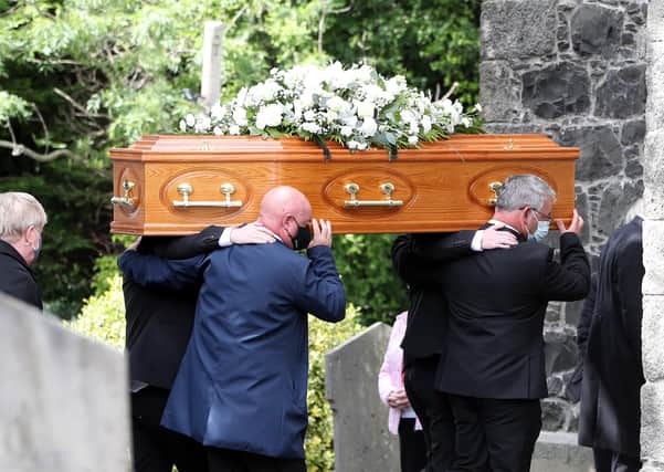 Matthew Biggerstaff's coffin is taken into Ballymore Parish Church in his home town of Tandragee before his funeral on Saturday