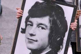 Hunger striker Thomas McElwee's image being carried in a parade.