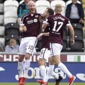 Hearts' Liam Boyce celebrates with Andy Halliday.