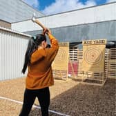 Axe throwing has become a popular leisure activity across NI, seen here at the Axe Yard Urban Axe Throwing in Belfast.