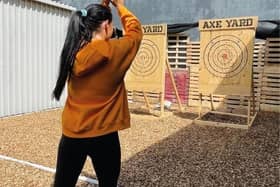 Axe throwing has become a popular leisure activity across NI, seen here at the Axe Yard Urban Axe Throwing in Belfast.