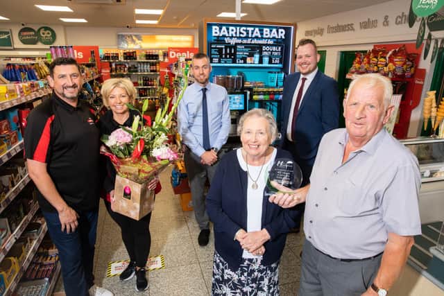 Andrew and Gillian Willis with Andrew’s mum and dad and the original owners of the store, Thomas and Margaret with Ciaran Haren and Justin Hayes from Henderson Group, owners of the brand in Northern Ireland