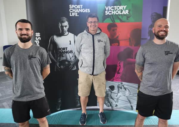 Gareth Brown (left) and Chris Kirk (right) with Gareth Maguire, CEO of Sport Changes Life