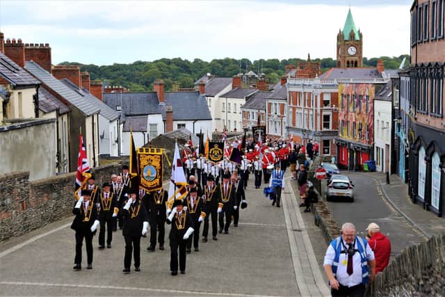 Press Eye - Belfast - Northern Ireland - 14th August 2021 Apprentice Boys of Derry ParadeApprentice Boys of Derry Relief of Derry Parade. The parade en route along the City Walls. Mandatory Credit ©Lorcan Doherty/Presseye