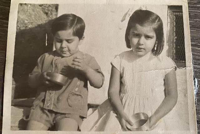 Nisha as a child in New Delhi with her brother Sanjay Bhatia