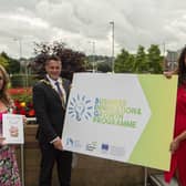 Catriona Jones with Mayor of Derry City and Strabane District Council, Alderman Graham Warke and Council Business Support Officer Tara Nicholas