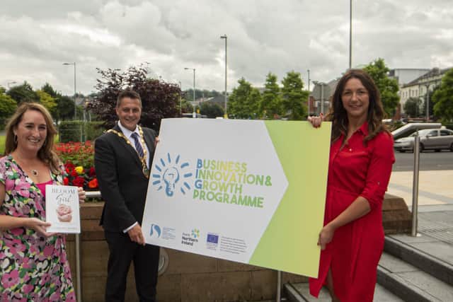 Catriona Jones with Mayor of Derry City and Strabane District Council, Alderman Graham Warke and Council Business Support Officer Tara Nicholas
