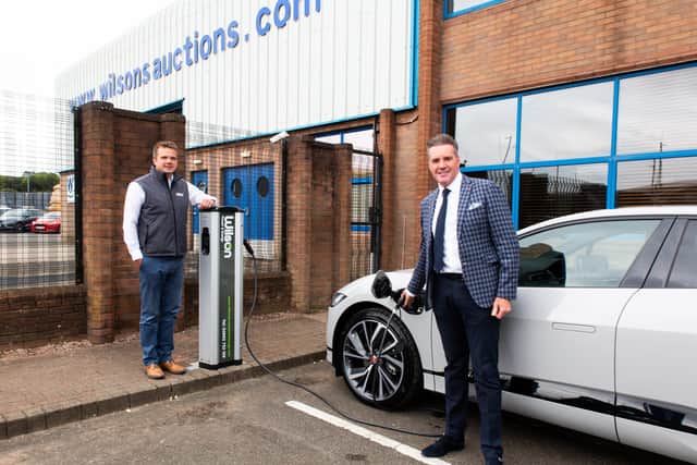 Peter Johnston, Wilsons Auctions Group Operations Director with Andrew Wilson, Managing Director of Wilson Power and Energy Ltd who installed the new Electric Vehicle Chargers at Wilsons Auctions premieses