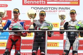 Glenn Irwin (left) finished as the runner-up in race three at Donington Park with brother Andrew (right) in third. They are joined on the rostrum by race winner Tommy Bridewell.