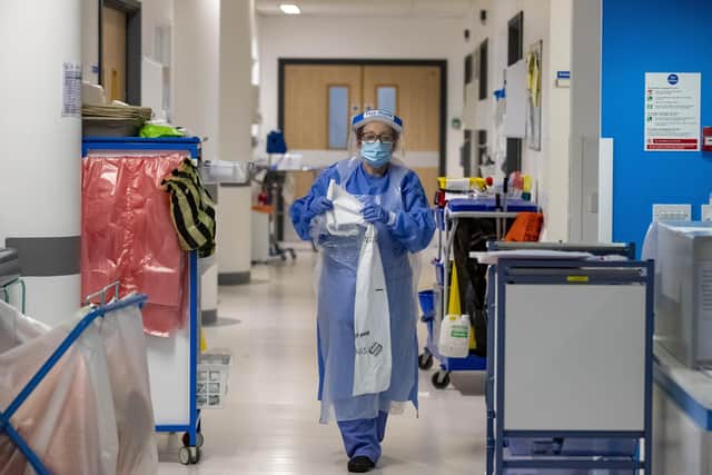 Hospital staff on one of five Covid-19 wards at Whiston Hospital in Merseyside where patients are taken to recover from the virus.