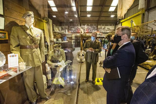 DUP leader Sir Jeffrey Donaldson MP looks at some of the artefacts belonging to Lieutenant Colonel Robert Blair 'Paddy' Mayne on display at the War Years Remembered Museum in Ballyclare