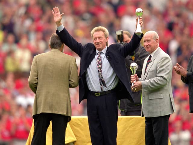 20 Aug 2000:  Manchester United legends (L to R) George Best, Denis Law and Bobby Charlton receive lifetime achievement awards from Eusebio as part of the National Footbal Awards during halftime in the FA Carling Premiership match against Newcastle United at Old Trafford in Manchester, England.  \ Mandatory Credit: Gary M Prior/Allsport