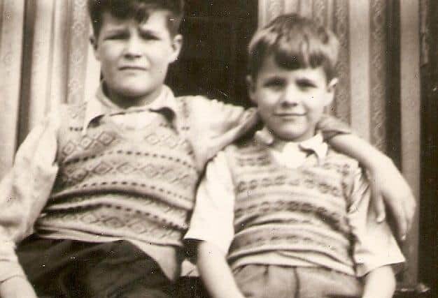 John Larmour with his younger brother George when they were children