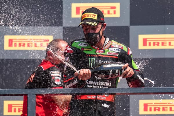 Jonathan Rea finished second in Sunday's Superpole race behind Scott Redding at Navarra in northern Spain.